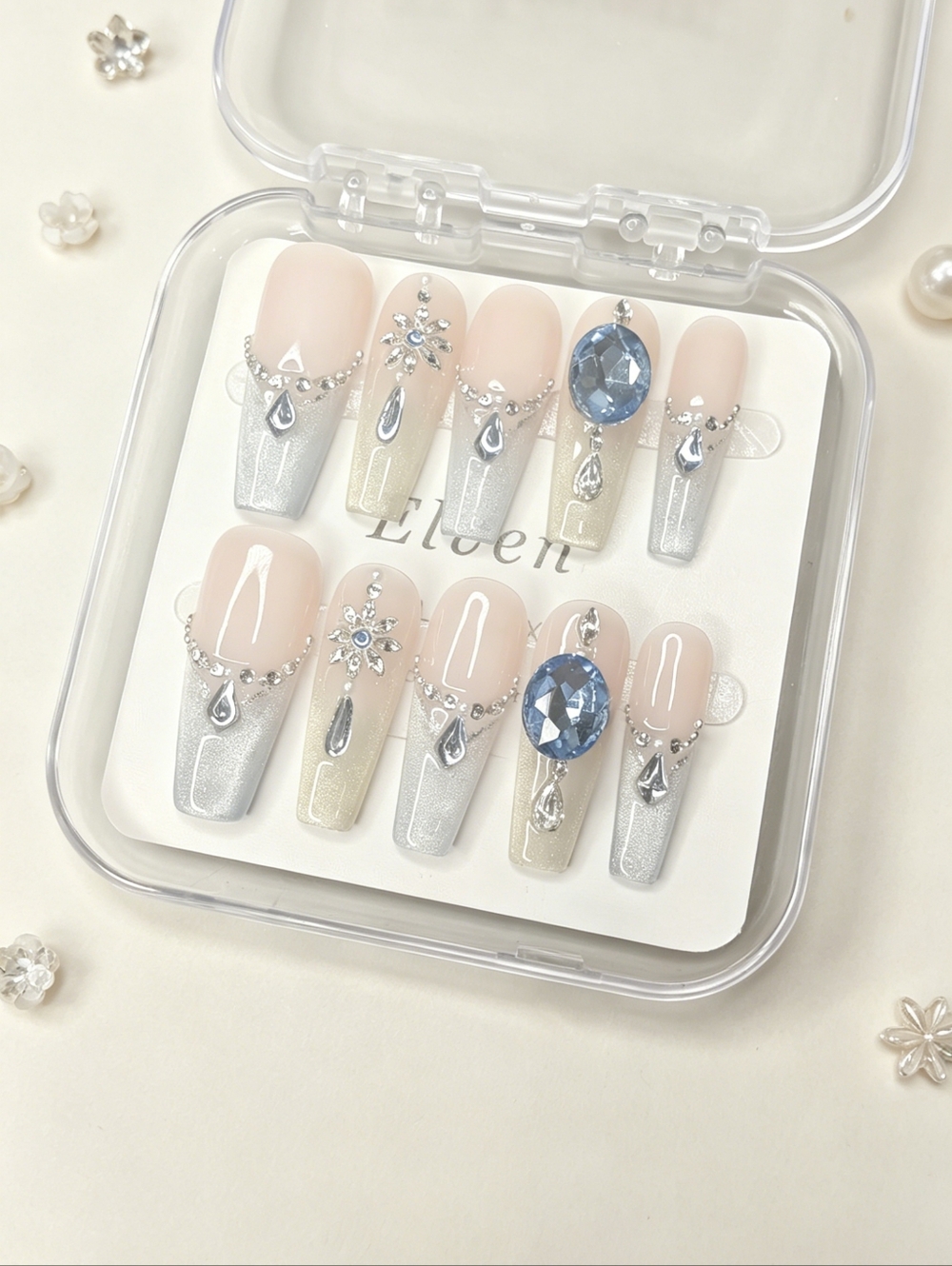 Chic Nude Long Coffin Press On Nails with Silver Shimmer and Blue Gem Accents